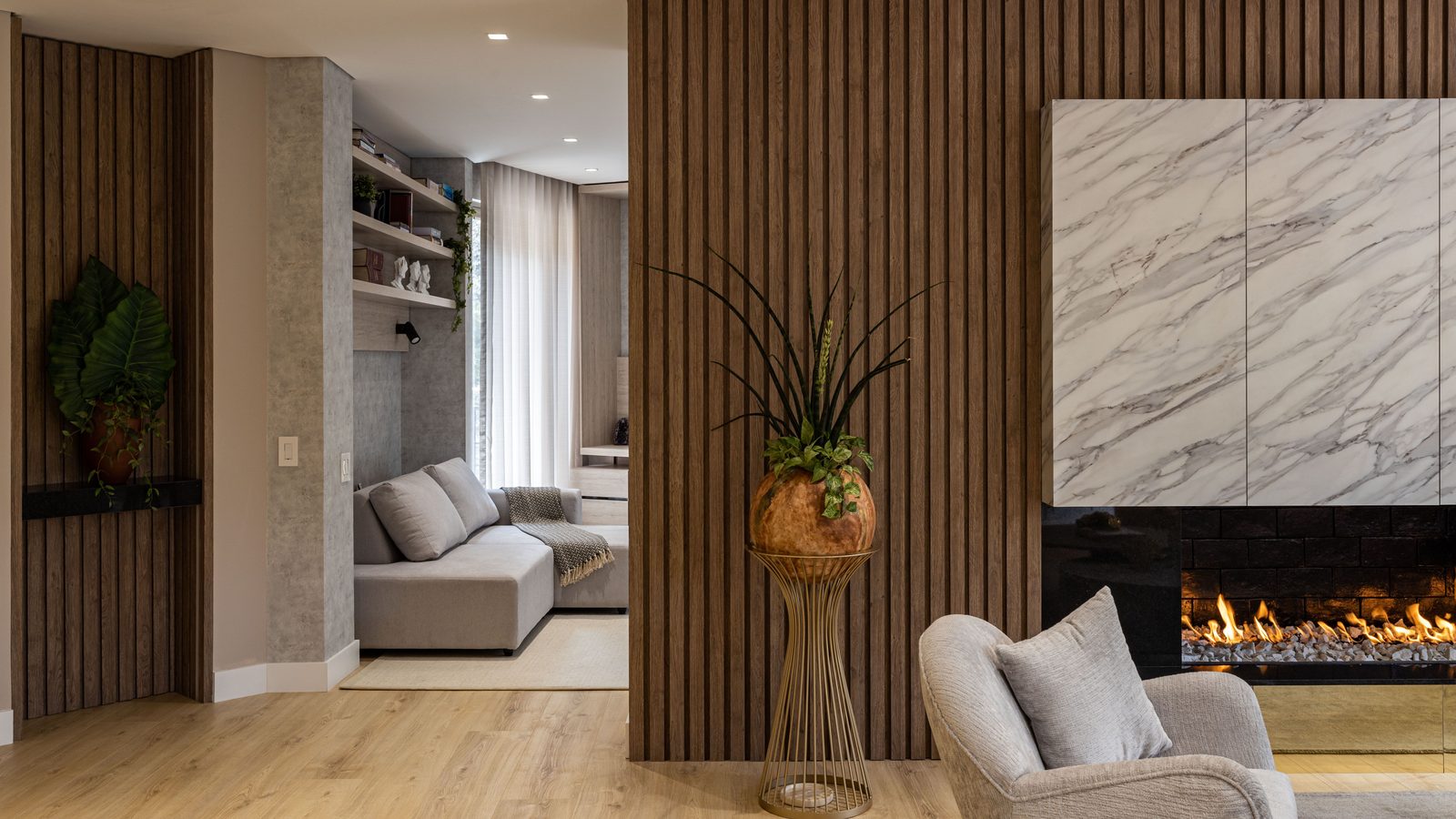 A finished wood slat feature wall wrapping a living room